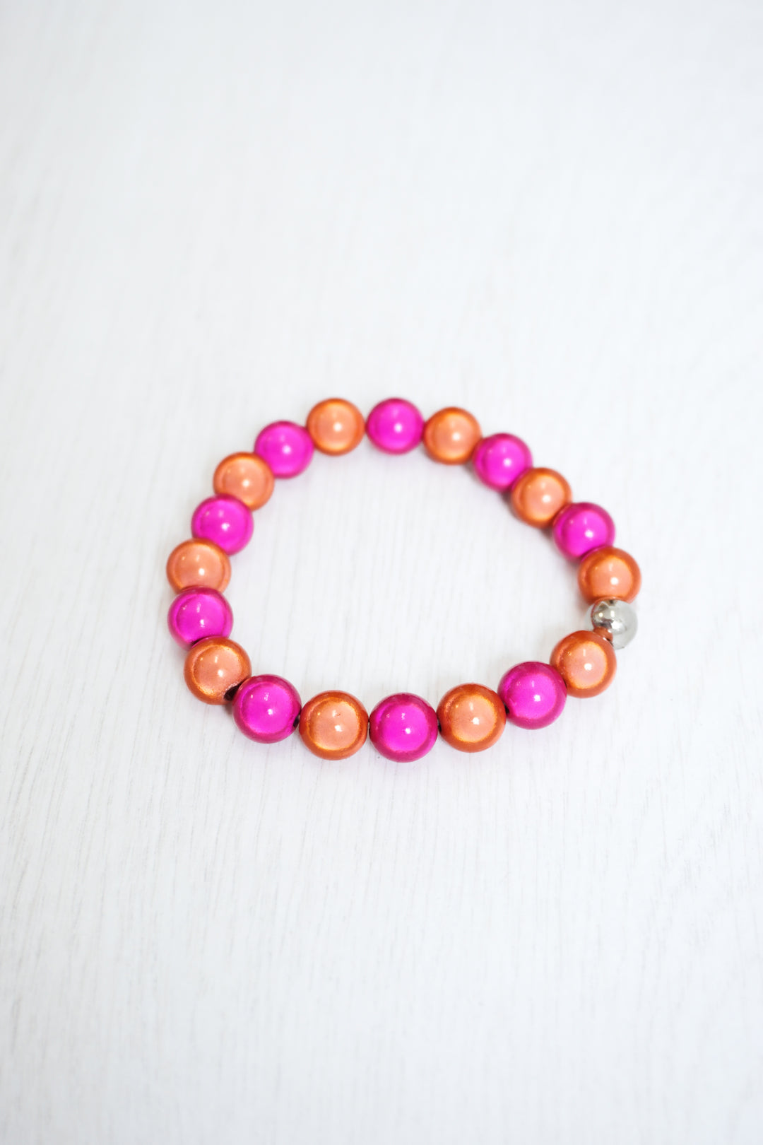 Leuchtendes Perlenarmband pink/orange