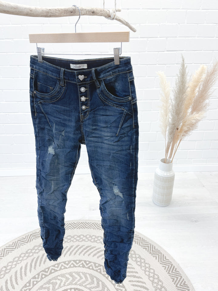Jeans mit unterlegten Rissen 34111